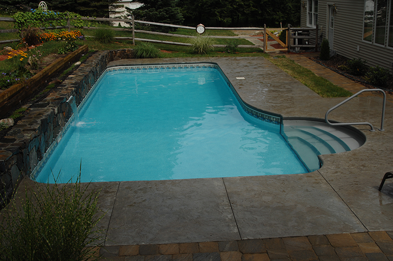 Swimming pool and stamped concrete project example 193